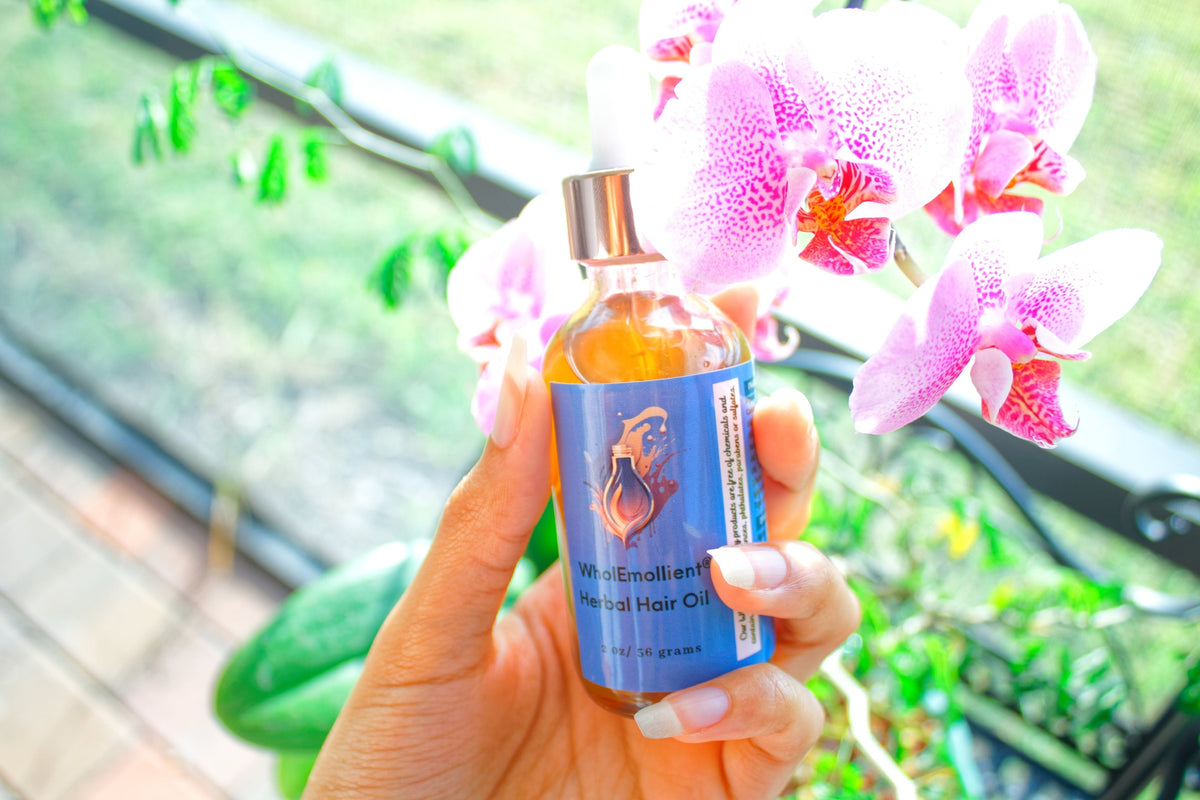 Handmade herbal hair oil with visible Chebe and Qasil powder – best oil for curly hair growth